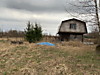 Вид дома и участка со стороны дороги